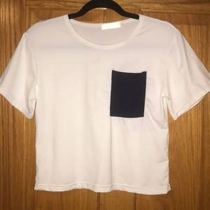 Plain white cropped tee with blue pocket